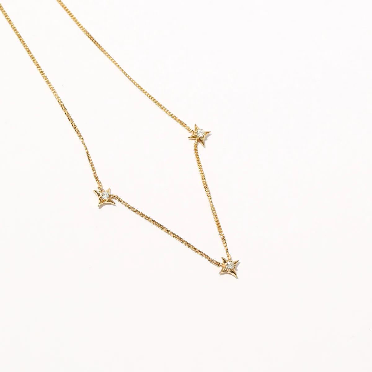 Cosmic Star Charm Necklace in Gold