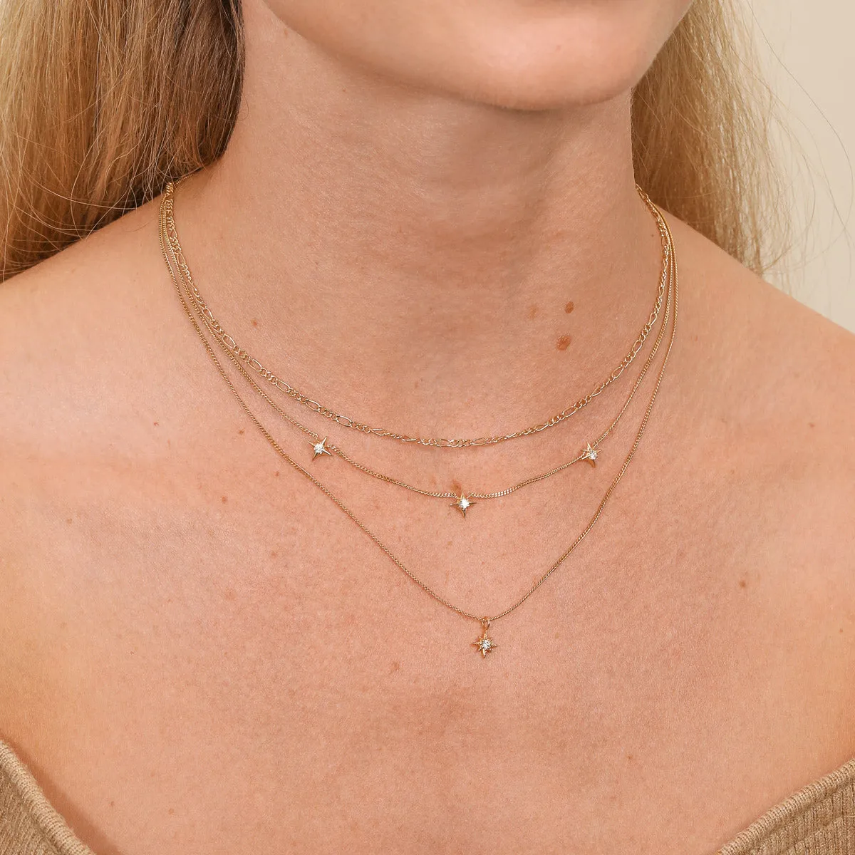 Cosmic Star Charm Necklace in Gold